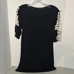 Elegant Black Top with Lace Sleeves